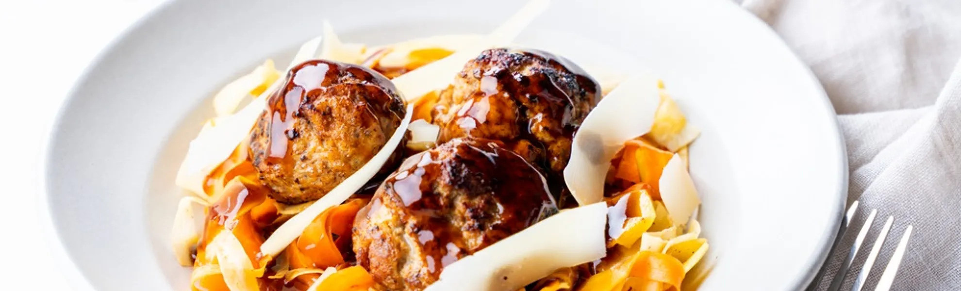 Pork Meatballs, Root Vegetable Tagliatelle, Pecorino Shavings, and Meat Jus